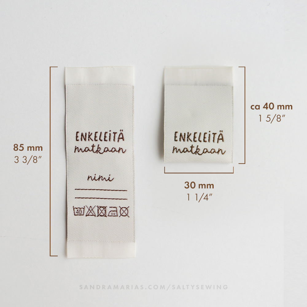 Vävt märke - Enkeleitä matkaan