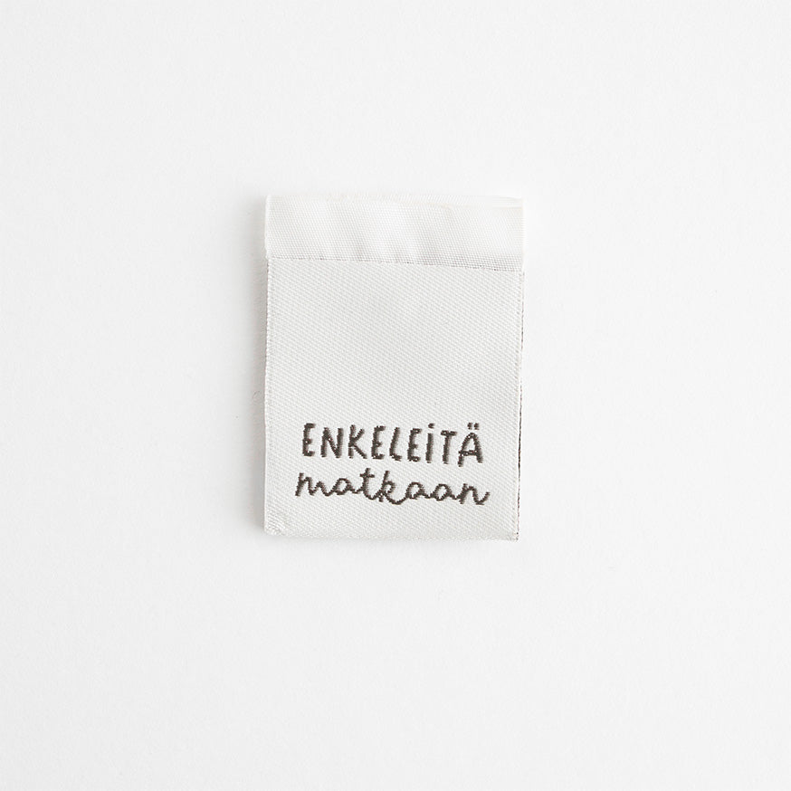 Vävt märke - Enkeleitä matkaan